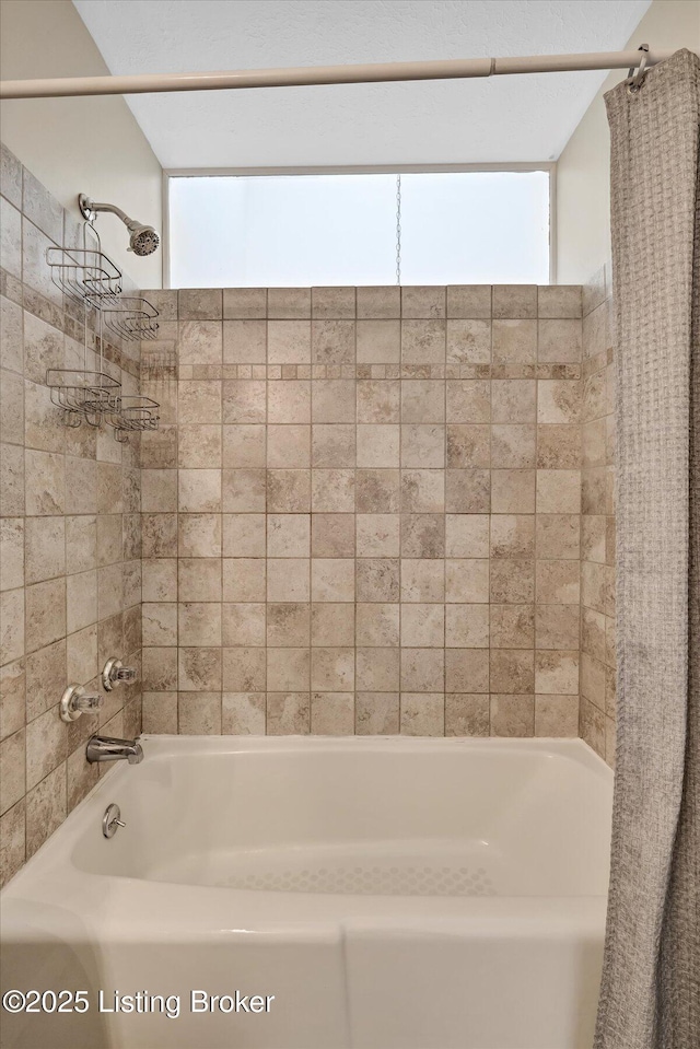 full bathroom with shower / bath combination with curtain