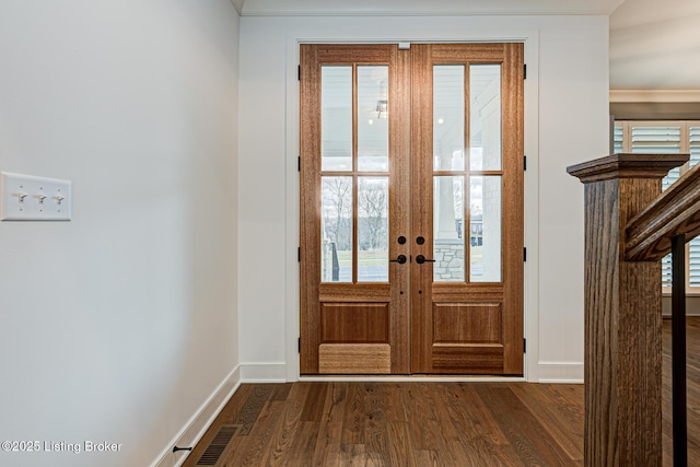 entryway featuring dark wood-style floors, visible vents, french doors, and baseboards