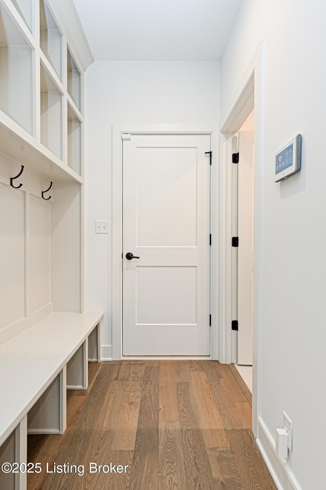 mudroom with wood finished floors