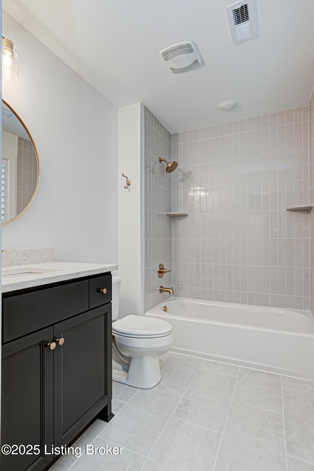 full bath featuring vanity,  shower combination, toilet, and visible vents