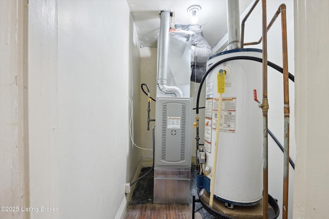 utility room with water heater