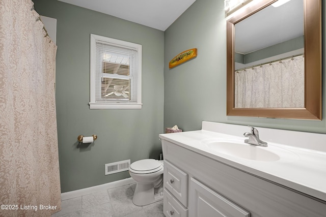 bathroom with visible vents, baseboards, toilet, and vanity