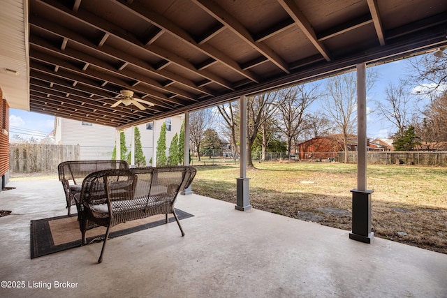 view of patio featuring a ceiling fan and a fenced backyard