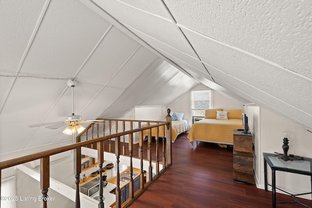 bedroom featuring vaulted ceiling and wood finished floors