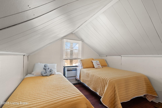 bedroom featuring a wall mounted air conditioner, lofted ceiling, and dark wood-style flooring