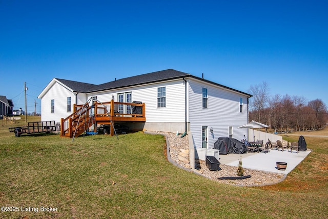 back of house with a yard, a patio, a deck, and stairway