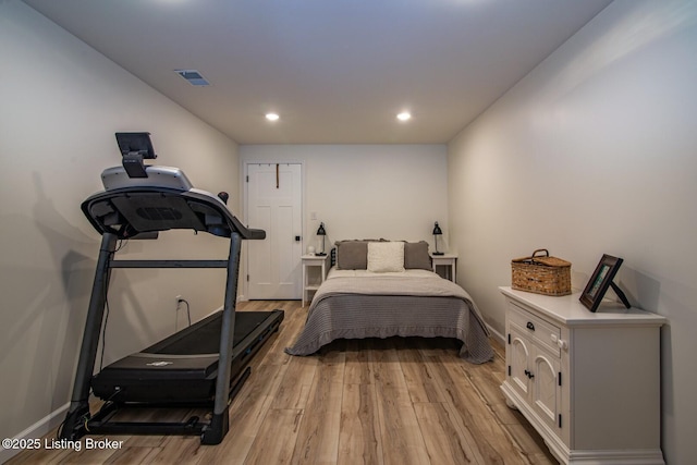 bedroom with recessed lighting, visible vents, light wood-style flooring, and baseboards