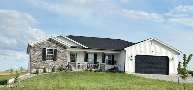 view of front of property with a porch, a front yard, gravel driveway, an attached garage, and stone siding