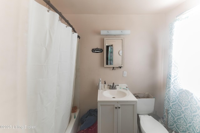 full bathroom with a shower with shower curtain, toilet, and vanity