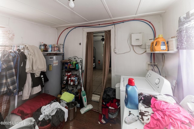 washroom with laundry area, wood finished floors, and electric water heater