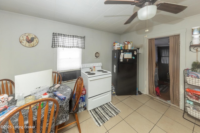 kitchen featuring light tile patterned floors, cooling unit, white range with electric cooktop, freestanding refrigerator, and ceiling fan