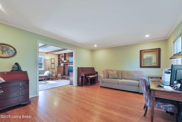 living room featuring recessed lighting, crown molding, baseboards, and wood finished floors