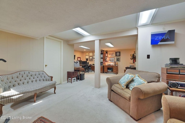 carpeted living room with a textured ceiling