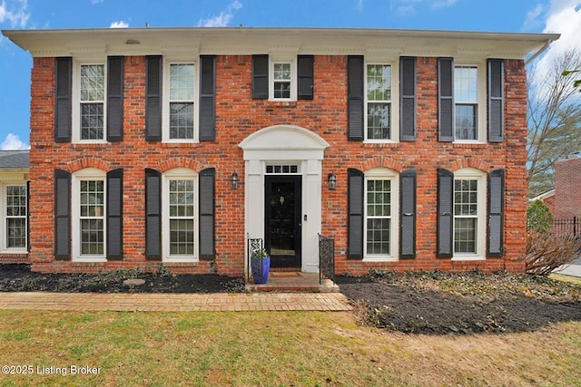 view of front of property with brick siding