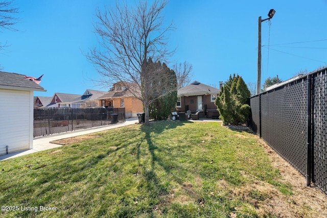 view of yard featuring a patio and a fenced backyard