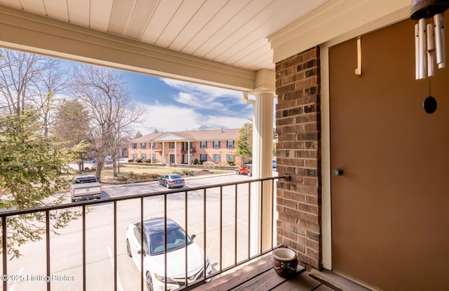 balcony featuring a residential view