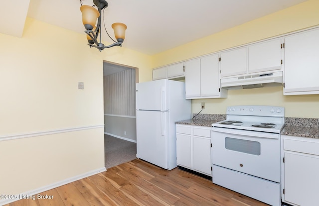 kitchen featuring white appliances, light wood finished floors, an inviting chandelier, under cabinet range hood, and white cabinetry