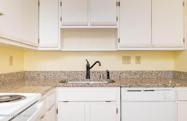 kitchen featuring a sink, dishwasher, and white cabinets