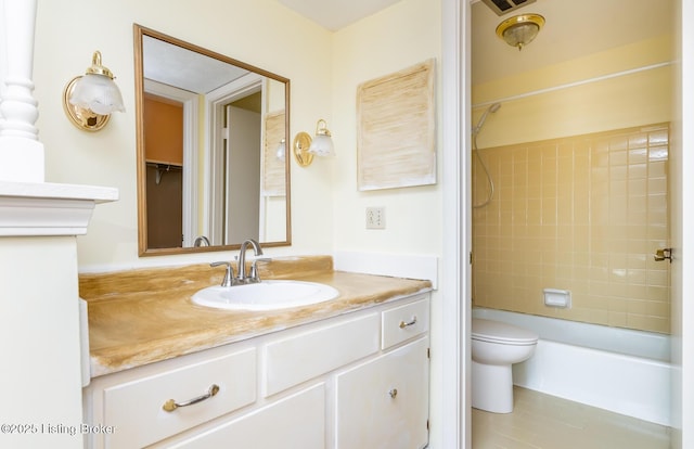 full bath featuring toilet, vanity, and shower / bathing tub combination