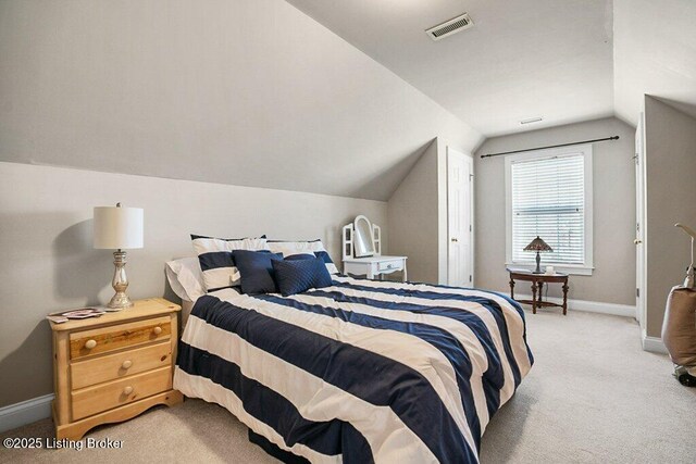 bedroom with visible vents, baseboards, light colored carpet, and lofted ceiling