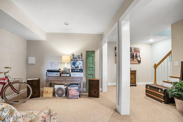 carpeted living area featuring stairway, recessed lighting, and baseboards