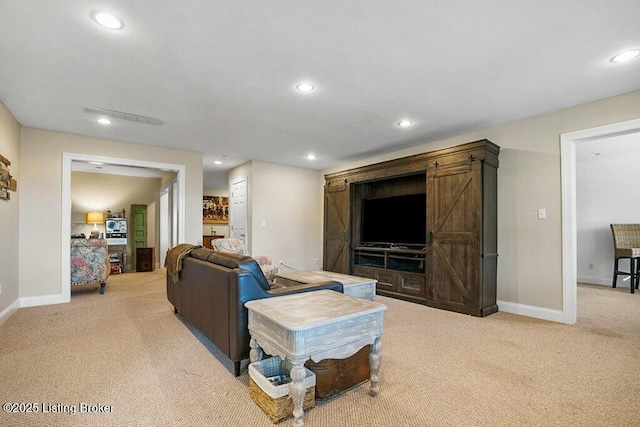 living area with recessed lighting, baseboards, and light carpet