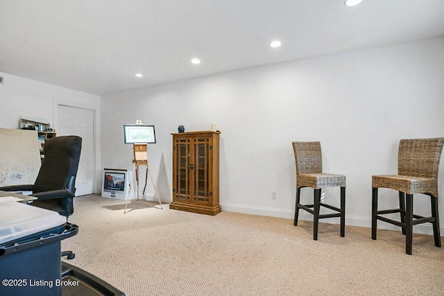 carpeted office space with recessed lighting and baseboards