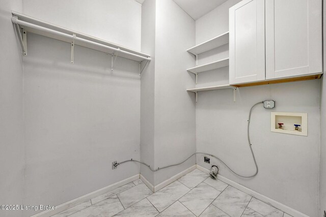 103 W Kentucky St, Louisville, KY 40203 - washroom featuring washer hookup, cabinet space, marble finish floor, and baseboards