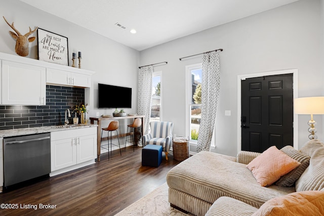 bedroom featuring a sink, visible vents, recessed lighting, and dark wood-style flooring