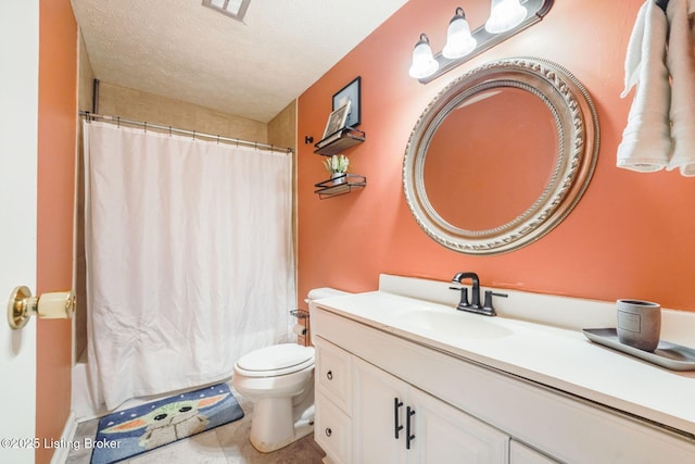 bathroom featuring tile patterned flooring, visible vents, toilet, vanity, and a textured ceiling