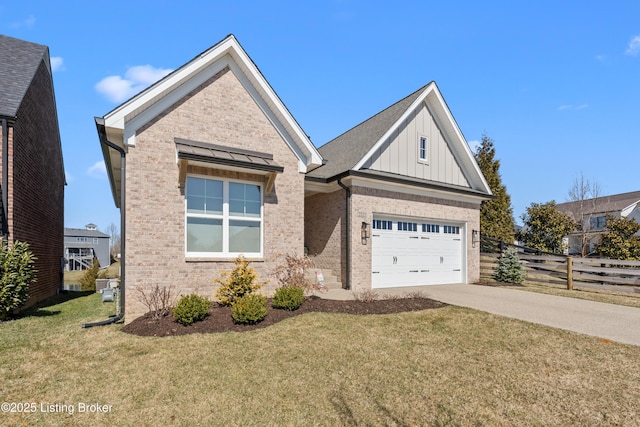 view of front of house featuring a front yard, fence, concrete driveway, board and batten siding, and brick siding