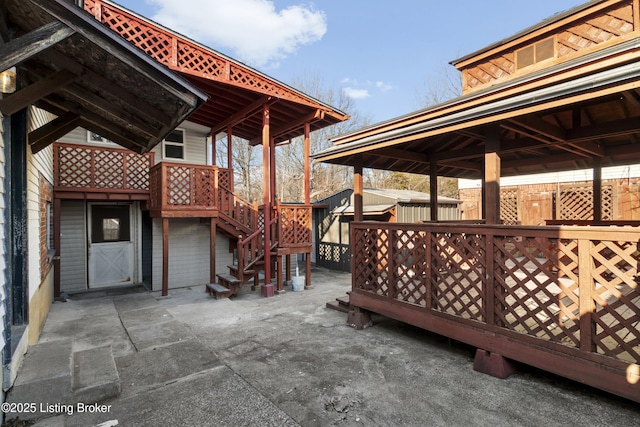 view of patio / terrace with stairway