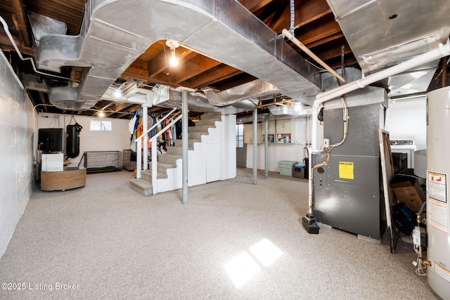 basement featuring stairway and heating unit