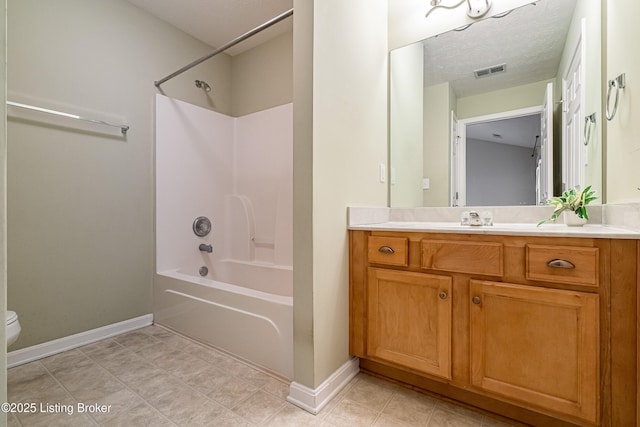 full bath with vanity,  shower combination, toilet, and visible vents