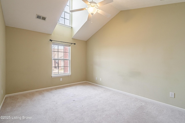 empty room with visible vents, ceiling fan, baseboards, and carpet