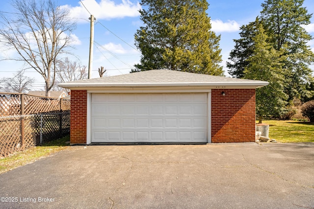 detached garage with fence