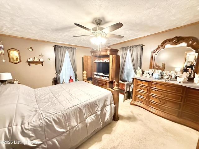 bedroom with a textured ceiling, crown molding, multiple windows, and light carpet