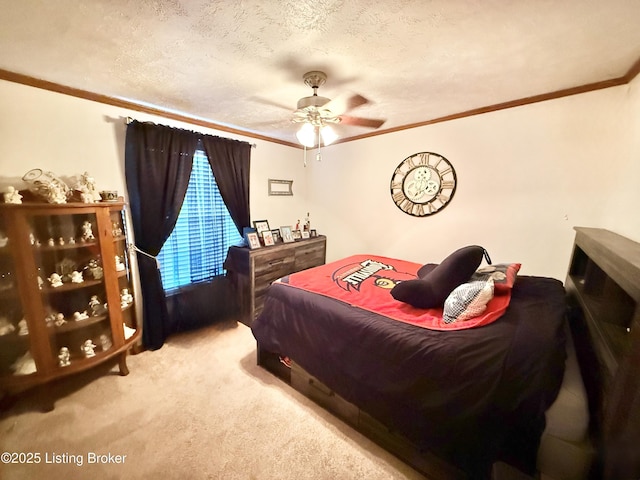 bedroom featuring crown molding, carpet, and a textured ceiling