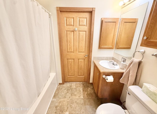 bathroom with tile patterned floors, toilet, vanity, and shower / bath combo