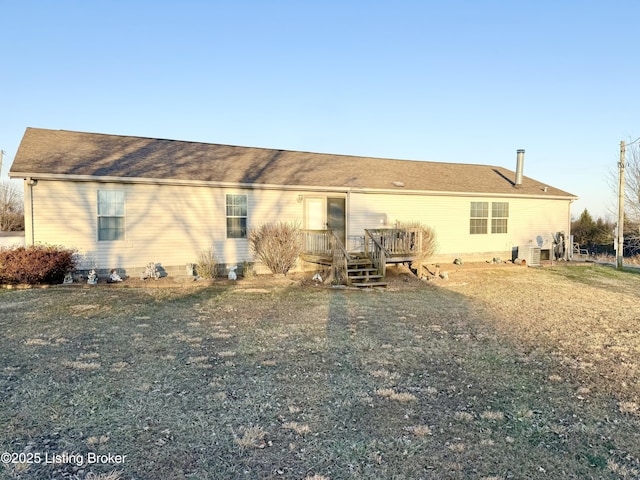 back of property featuring cooling unit and a deck