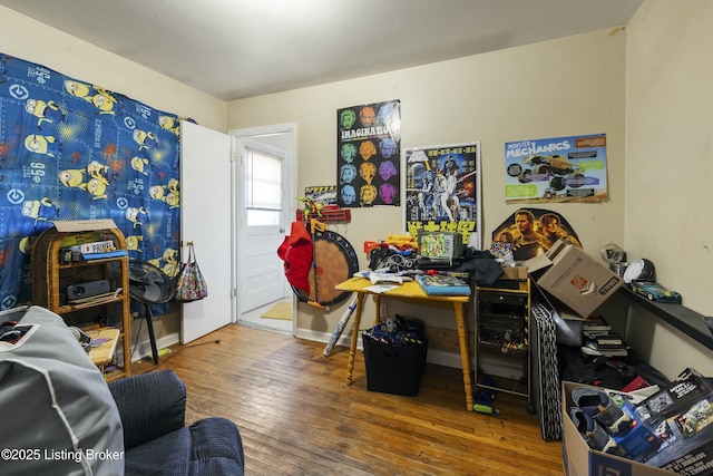 office space with wood-type flooring