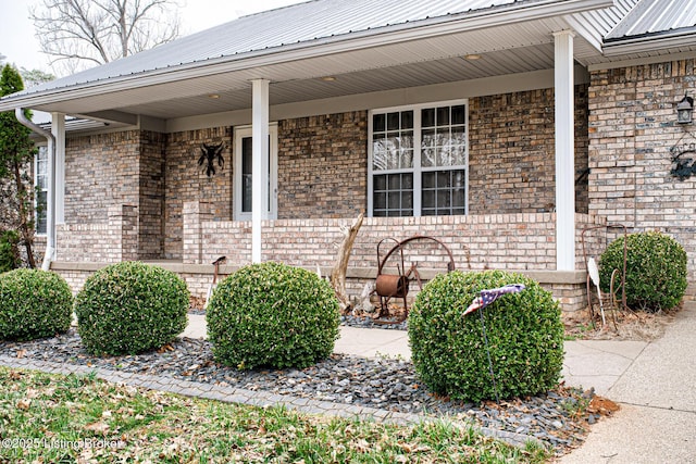 1670 Pine Creek Trl, Shepherdsville, KY 40165 - doorway to property with brick siding and covered porch