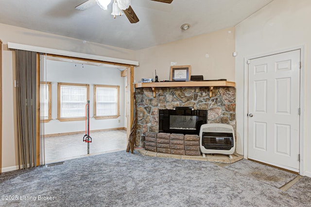 1670 Pine Creek Trl, Shepherdsville, KY 40165 - carpeted living area with heating unit, baseboards, ceiling fan, a stone fireplace, and vaulted ceiling