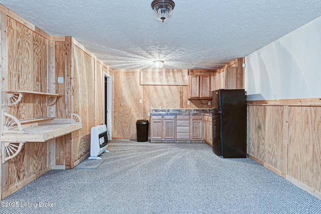 1670 Pine Creek Trl, Shepherdsville, KY 40165 - interior space featuring heating unit, light colored carpet, wood walls, and freestanding refrigerator