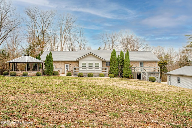 1670 Pine Creek Trl, Shepherdsville, KY 40165 - rear view of property with a gazebo, a wooden deck, a lawn, and metal roof
