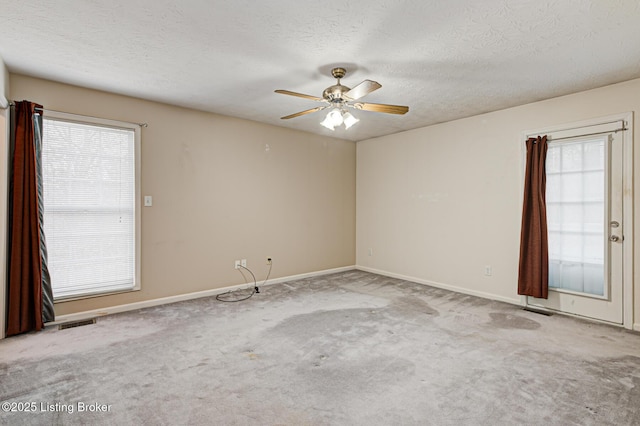 1670 Pine Creek Trl, Shepherdsville, KY 40165 - unfurnished room with visible vents, carpet, ceiling fan, and a textured ceiling