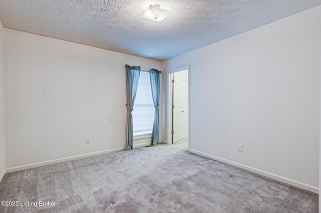 1670 Pine Creek Trl, Shepherdsville, KY 40165 - carpeted empty room with baseboards and a textured ceiling