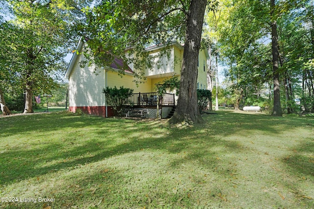 view of yard featuring a deck