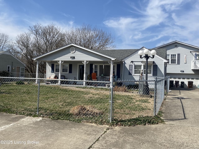 view of front of home with a fenced front yard, a porch, a front lawn, and a shingled roof