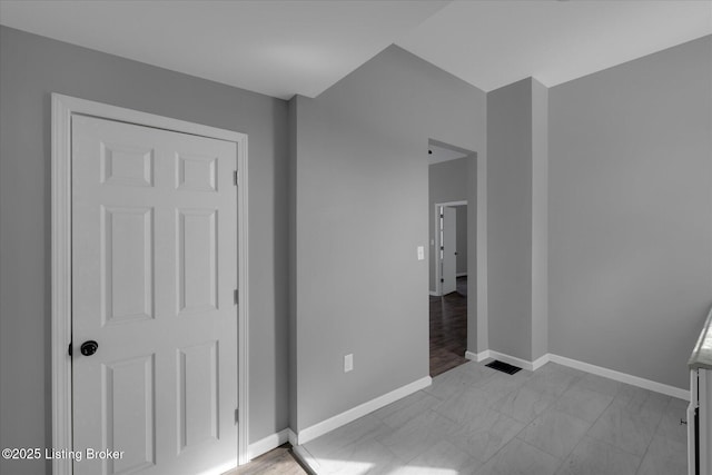 unfurnished bedroom featuring baseboards